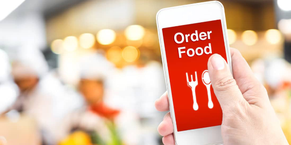 icon image for online ordering of a smart phone being held in a hand with red screen that has in text 'order food' on it